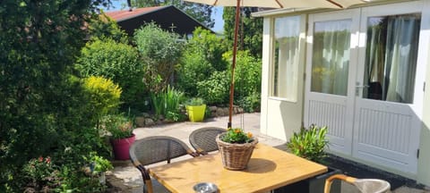 Property building, Day, Garden, View (from property/room), Dining area