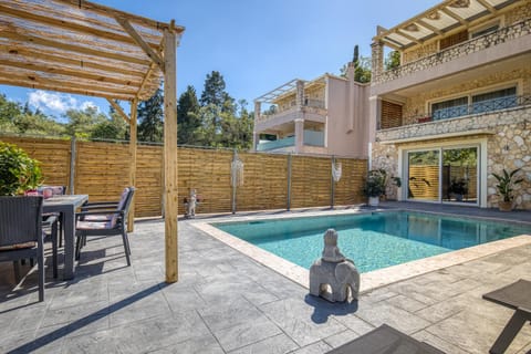 Property building, Pool view, Swimming pool, sunbed