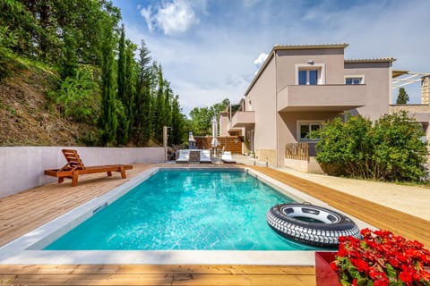 Property building, Day, Natural landscape, Garden, Garden view, Pool view, Swimming pool, Swimming pool, sunbed
