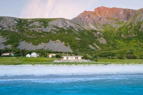 Property building, Nearby landmark, Natural landscape, Beach, Mountain view