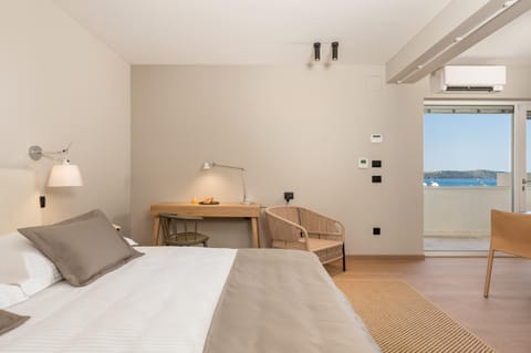 Bed, Seating area, Sea view