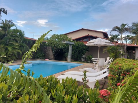 Swimming pool, sunbed