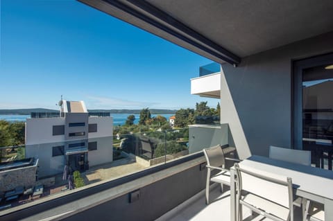 Property building, Patio, View (from property/room), Balcony/Terrace, Living room, Seating area