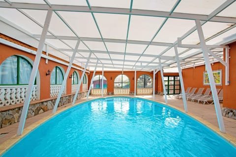 Property building, Living room, Swimming pool