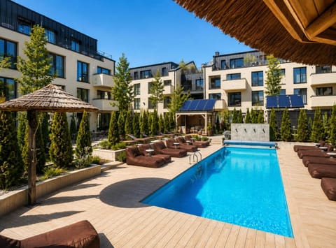 Property building, Patio, Day, Garden, Garden view, Pool view, Swimming pool, sunbed