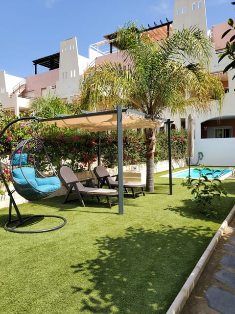 Property building, Patio, Garden, Swimming pool