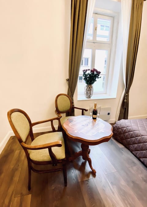 View (from property/room), Living room, Decorative detail, Seating area, Dining area, Drinks, Inner courtyard view, internet