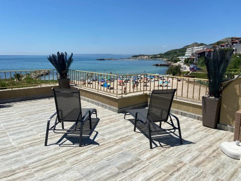 Patio, Nearby landmark, Day, Natural landscape, View (from property/room), Balcony/Terrace, Beach, Sea view, sunbed