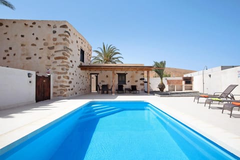 Property building, Living room, Swimming pool