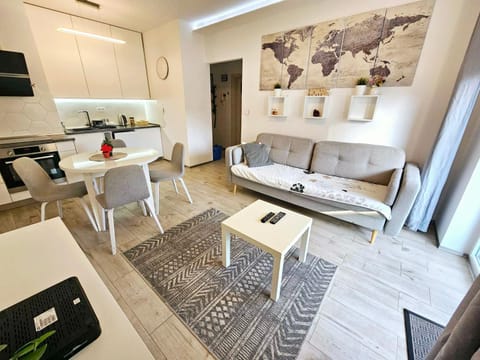 Kitchen or kitchenette, Living room, Seating area, Dining area