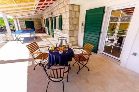 Property building, Patio, Table tennis, Seating area