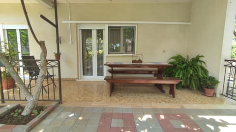 Patio, Facade/entrance, Seating area, Dining area, Garden view