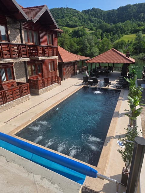Property building, Natural landscape, Pool view