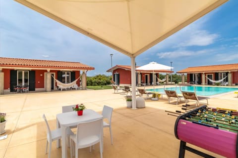 Property building, Patio, Day, Pool view, Swimming pool