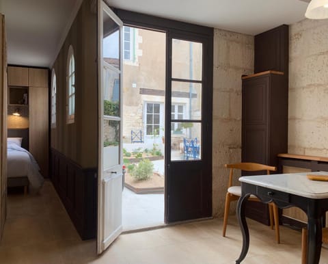 Facade/entrance, Dining area, Bedroom, Inner courtyard view