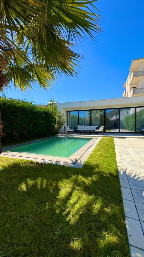 Property building, Day, Natural landscape, Garden, Garden view, Pool view, Swimming pool