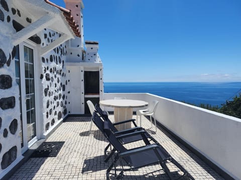 Property building, Patio, Day, View (from property/room), Balcony/Terrace, Seating area, Sea view, sunbed