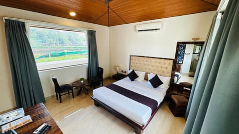 Bed, air conditioner
