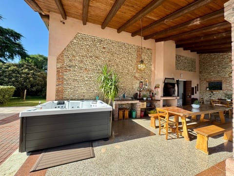 Property building, Patio, BBQ facilities, Dining area, Evening entertainment, Swimming pool