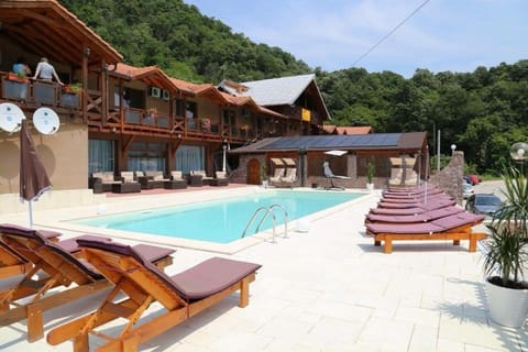 Property building, Natural landscape, Mountain view, Pool view, Swimming pool, sunbed