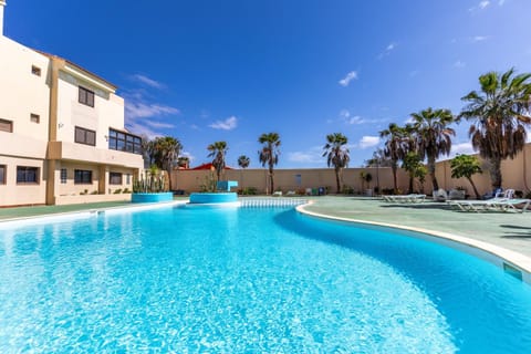 Property building, Living room, Swimming pool