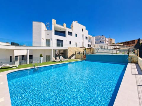 Property building, Day, Pool view, Swimming pool, sunbed