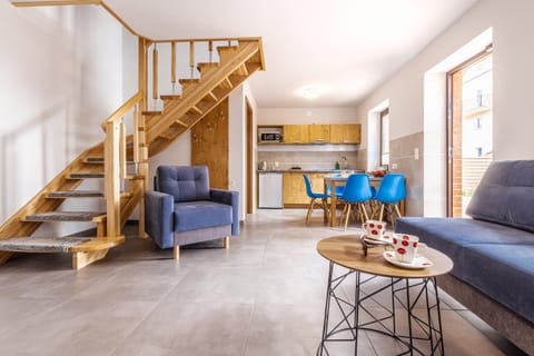 Kitchen or kitchenette, Living room, Seating area, Dining area
