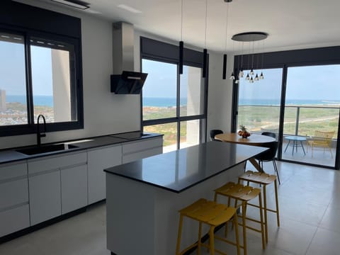 Kitchen or kitchenette, Dining area, Sea view