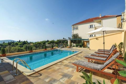 Property building, Pool view, Swimming pool, sunbed
