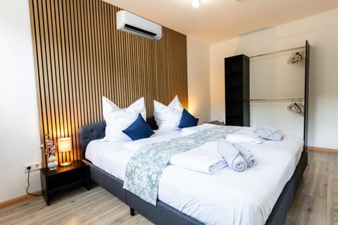 Bed, Photo of the whole room, Bedroom, towels, wardrobe, air conditioner