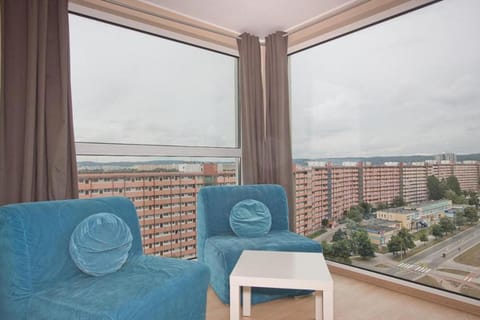 View (from property/room), Living room, Seating area, City view