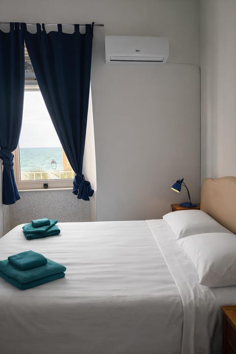 Bed, Photo of the whole room, Bedroom, towels, air conditioner