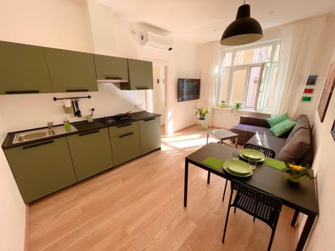 TV and multimedia, Balcony/Terrace, Kitchen or kitchenette, Living room, Seating area, Dining area, Inner courtyard view, dishwasher, microwave, stove, toaster, air conditioner