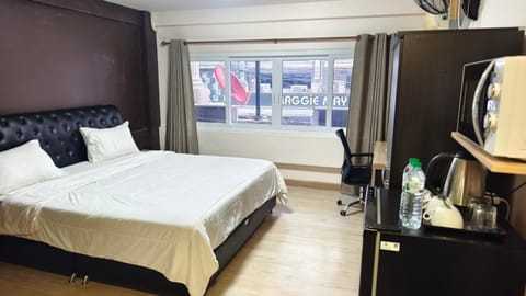 Bed, View (from property/room), Bedroom, City view, microwave, safe, wardrobe