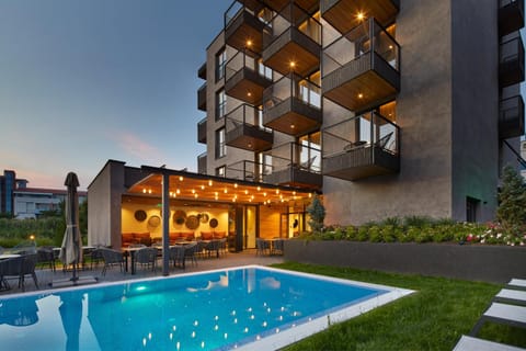 Property building, Patio, Day, Pool view, Swimming pool