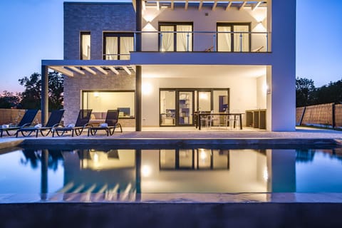 Property building, Swimming pool, Sunset