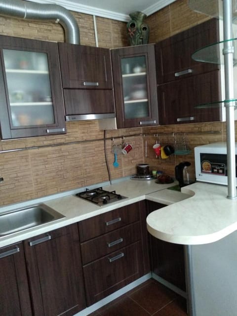 Kitchen or kitchenette, stove