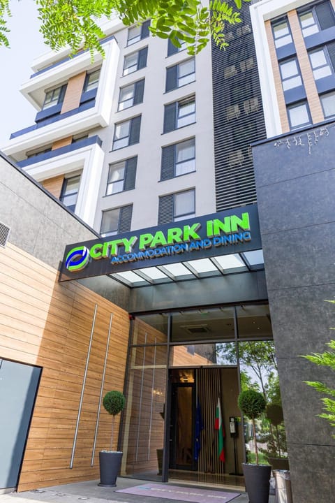 Property building, Facade/entrance, Day, Property logo or sign