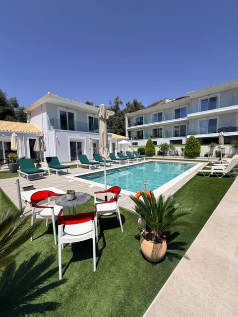 Property building, Patio, Day, Pool view, Swimming pool, sunbed