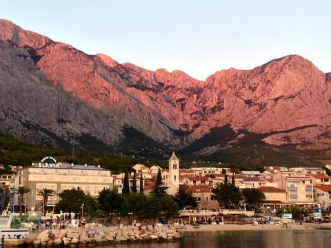 Neighbourhood, Beach, Text overlay, City view, Mountain view, Sea view