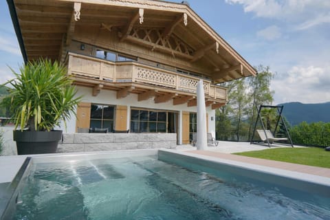 Property building, Natural landscape, Mountain view, Swimming pool, sunbed