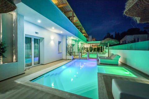 Night, Pool view, Swimming pool, sunbed