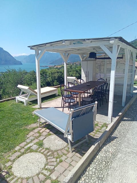 Property building, Dining area, Lake view, sunbed