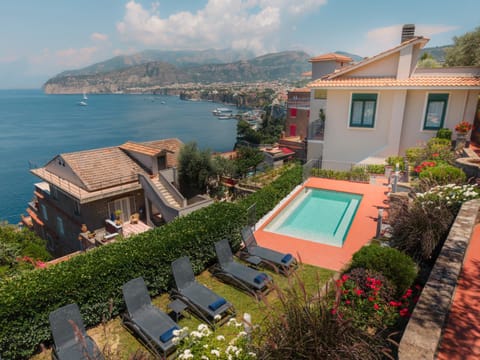 Property building, Day, Natural landscape, Mountain view, Pool view, Sea view, Swimming pool, sunbed