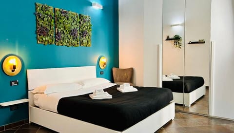 Bed, Decorative detail, Decorative detail, towels, towels