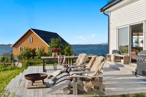 Property building, Patio, Day, Natural landscape, Seating area, Sea view, sunbed