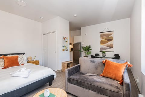 Bed, Living room, Seating area, Bedroom
