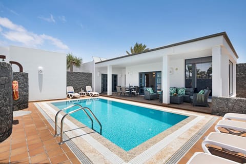 Property building, Living room, Swimming pool