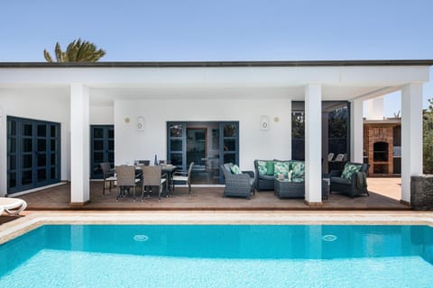 Property building, Living room, Swimming pool