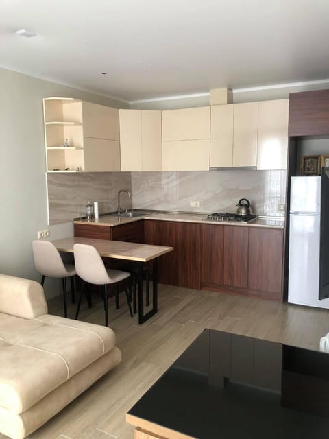 Kitchen or kitchenette, Living room, Seating area, Dining area